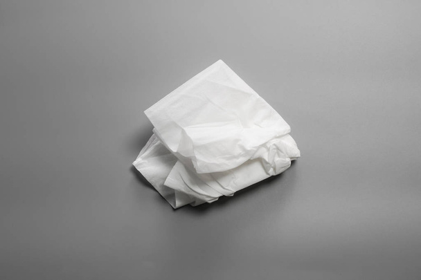 White tissues on gray background - Foto, afbeelding