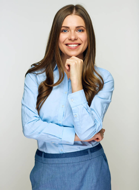 portrait of smiling successful businesswoman wearing blue shirt looking at camera  - Fotó, kép