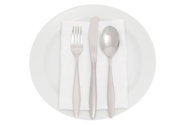 bord met bestek en servetring, elegant servies omvatten uitknippad - Foto, afbeelding