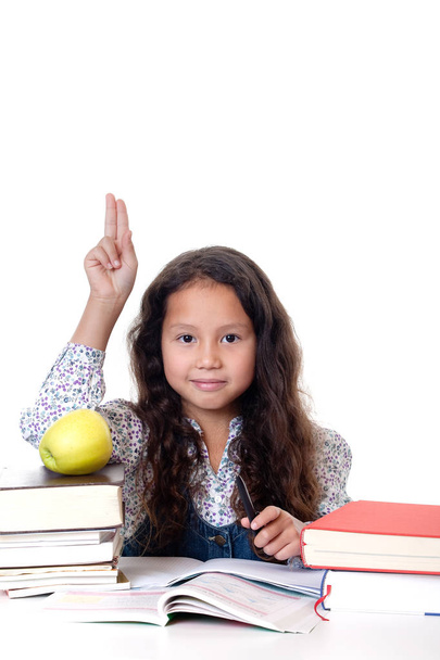 Oppilas luokkahuoneessa, tyttö omenan ja kirjoja koulussa
 - Valokuva, kuva