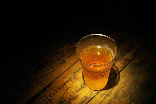 Cold Beer Glass on Old Wood Table - Fotografie, Obrázek