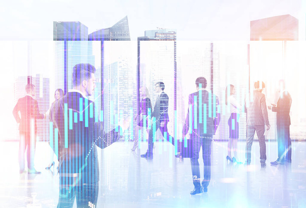 Business people walking and talking in a modern office. Forex style graphs in the foreground. A cityscape. Business lifestyle concept. Toned image double exposure mock up - Photo, Image