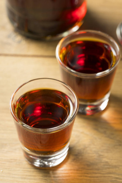 Red Sloe Gin Liqueur in a Glass - Fotó, kép