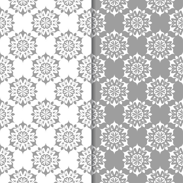 White and gray set of floral backgrounds. Seamless patterns for textile and wallpapers - Vektori, kuva