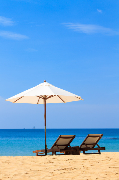 beds and umbrella on a beach - Photo, Image