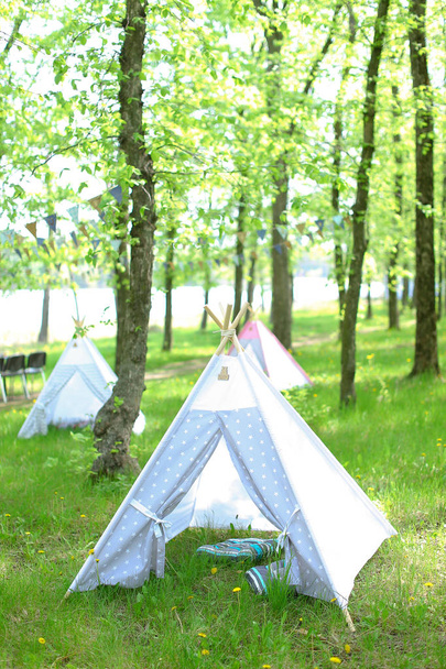 Blue handmade tent in forest. - Photo, Image