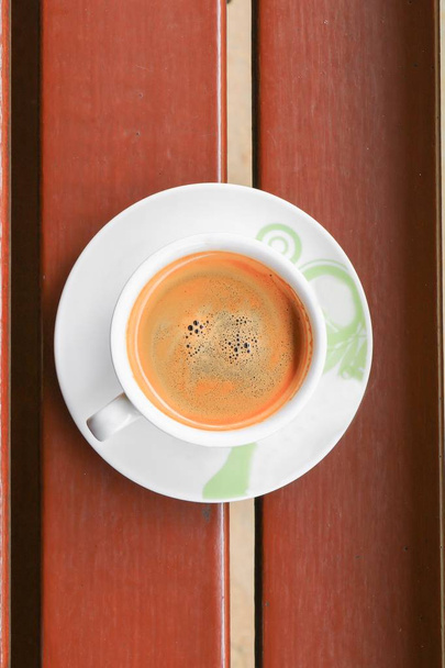 café espresso primer plano sobre fondo de madera
 - Foto, Imagen
