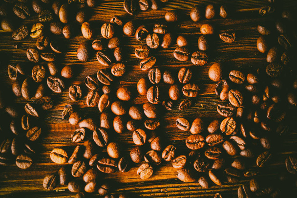 表の背景のコーヒー豆 - 写真・画像
