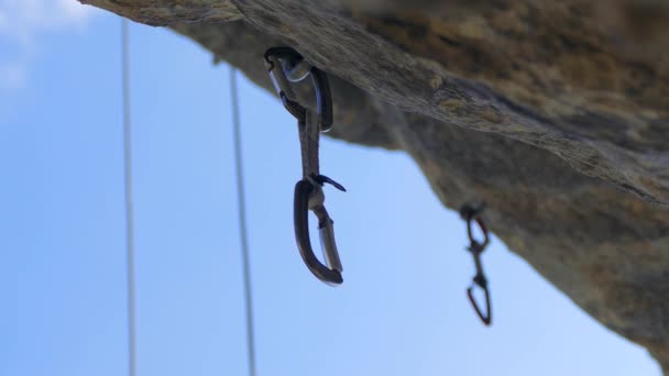 Safety carabiners nailed to the wall for securing the cable - Footage, Video