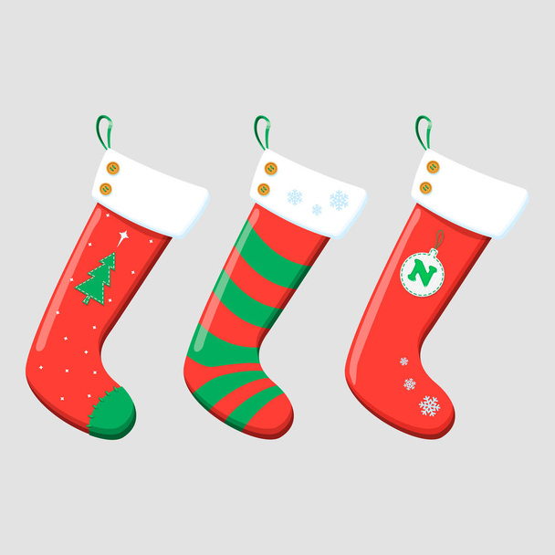 Kerst kousen rood groen kleuren. Opknoping decoraties voor de feestdagen voor geschenken. - Vector, afbeelding
