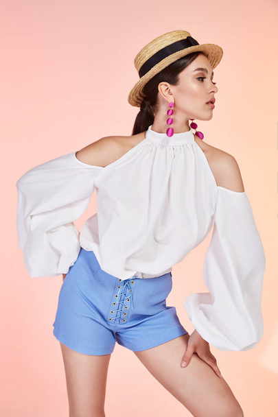 Brunette sexy elegant woman natural beauty fashion style clothes summer blouse short lady romantic meeting date party style glamour model trend hair makeup accessory bag straw hat jewelry earring. - Photo, Image