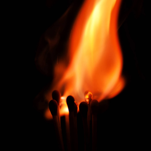 Burning matches close-up over black background - Photo, Image