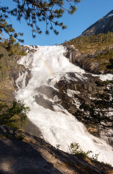 Photo of Rapid Stunning Waterfall in Husedalen Valley, Norway. Aerial view. Summer time. - Foto, Imagen