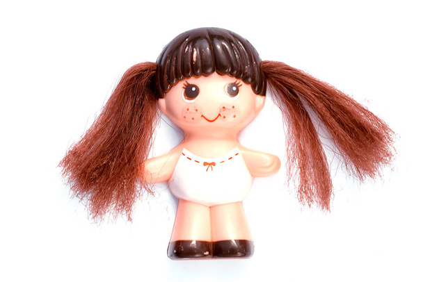funny pig-tailed doll little girl isolated over white - Photo, Image
