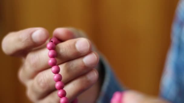 young muslim zikr in mosque with beads - Materiaali, video