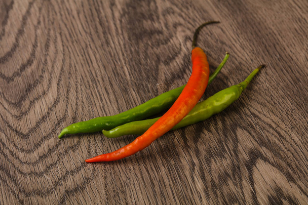 Red Hot Chili peppers na podłoże drewniane - Zdjęcie, obraz