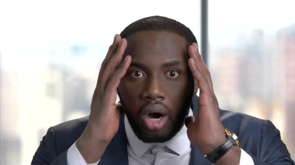 Close up face of shocked dark-skinned businessman. - Footage, Video
