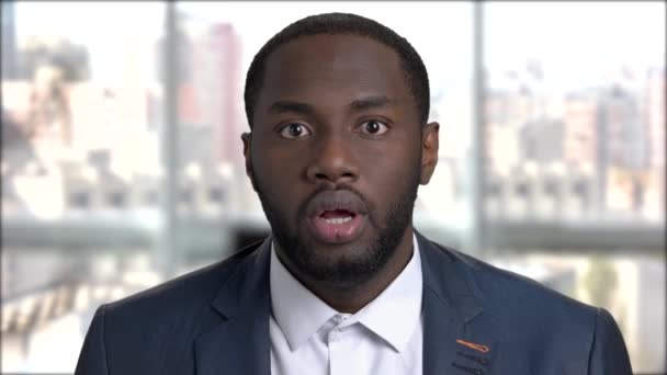 Face of surprised dark-skinned businessman. - Footage, Video