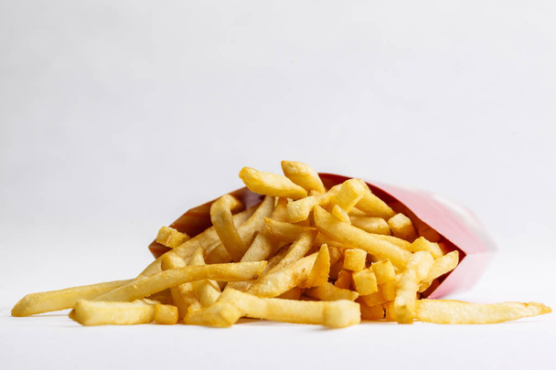 Fresh fried french fries with ketchup on wooden background - Photo, Image