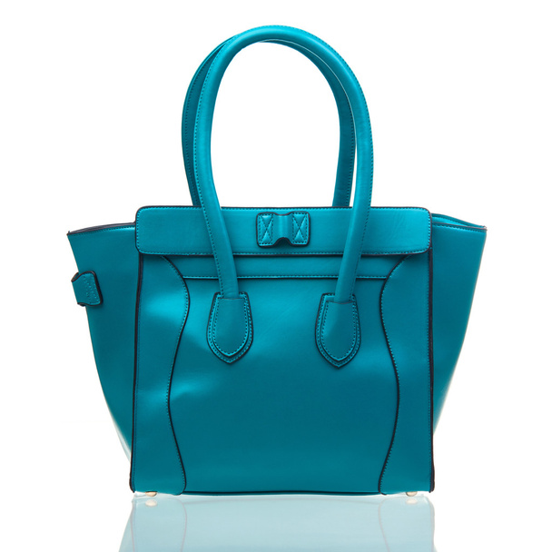 Голубая женская сумка на белом фоне
 - Фото, изображение