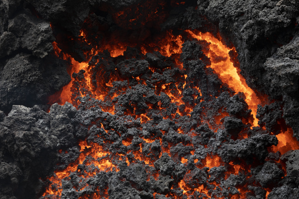 Close-up van een lavastroom van de vulkaan Kilauea op Hawaï - Foto, afbeelding