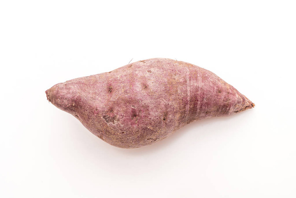 purple sweet potato isolated on white background - Fotó, kép