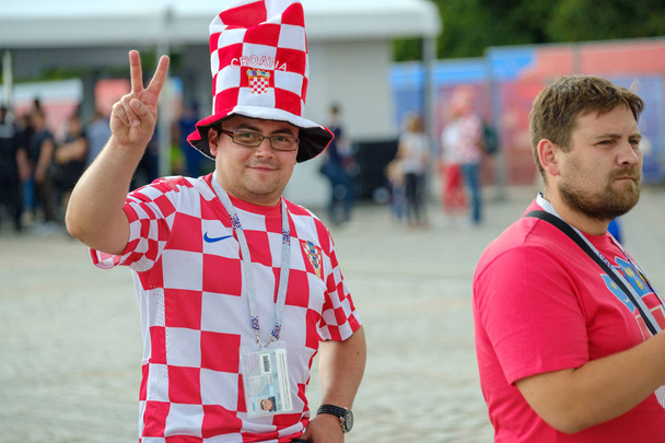 Football fans support teams on the streets of the city on the day of the match between Croatia and Nigeria - Фото, зображення