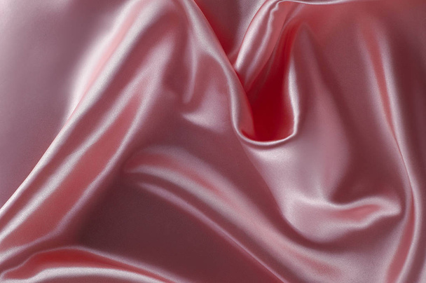 Astratto sfondo di lusso di seta, pezzo di stoffa, texture tessuto rosa chiaro
 - Foto, immagini