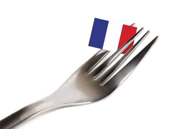 Vork op witte achtergrond met Franse vlag - Foto, afbeelding