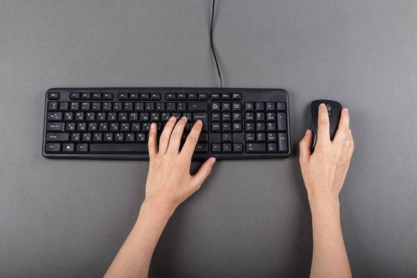 two female hands on the keyboard, work in the office, office equipment, space for tex - Zdjęcie, obraz