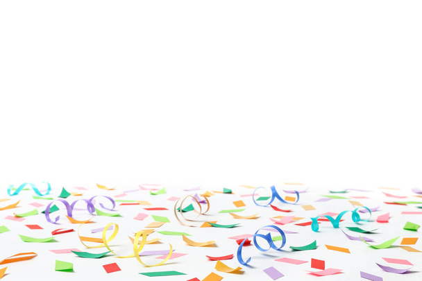 Colorful confetti and streamers on white background - Zdjęcie, obraz