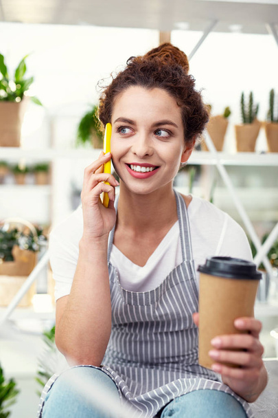 Positive cheerful woman talking on the phone - Photo, Image