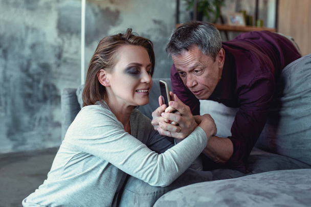 Furious emotional husband taking phone away - Foto, Imagem