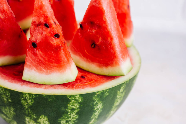 Close up of watermelon slices on table, summer healthy eating concept - Foto, immagini