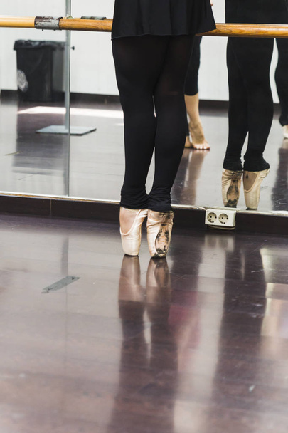 A Ballerina dancing, closeup on legs and shoes. - Foto, Imagen