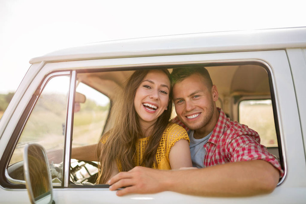 Young couple out on a road trip - Foto, Bild