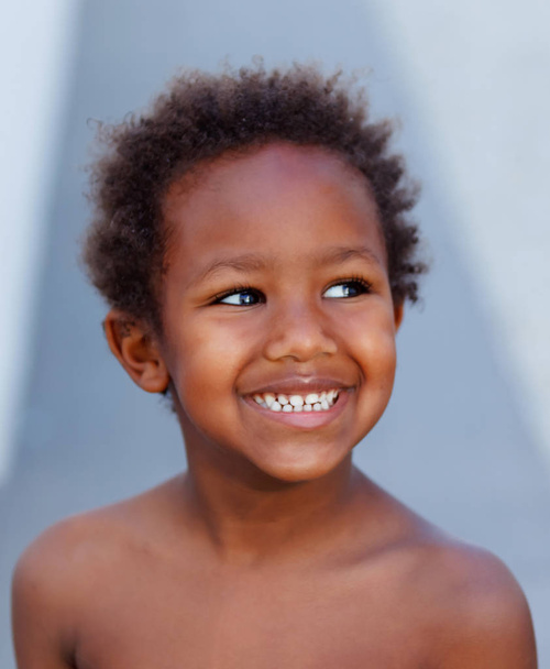 funny and happy African little boy , closeup  - Fotó, kép