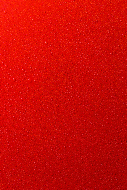 superficie vacía roja con gotas de agua
 - Foto, Imagen