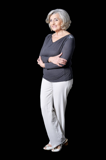 happy senior woman  posing isolated on back  background - Фото, изображение