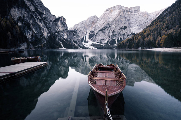 Wooden boat at the alpine mountain lake. Lago di Braies, Dolomites Alps, Italy - Fotografie, Obrázek