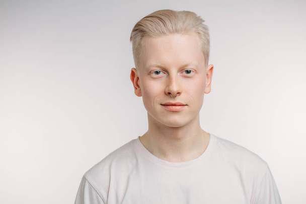 Handsome blond man with blue eyes isolated on white - Valokuva, kuva