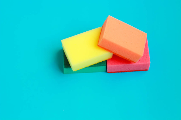 Cleaning sponges  on color background - Foto, immagini