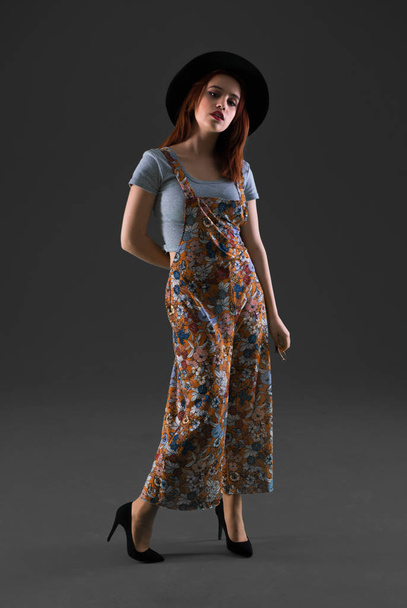 Young redhead girl posing in studio - Photo, Image