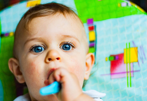 Portrait of a Baby Boy with Blue Eyes - Foto, Imagen