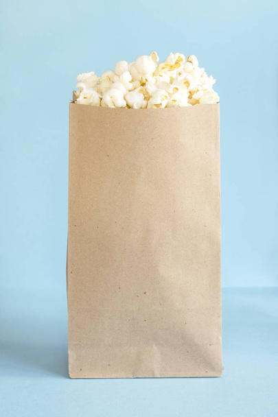Popcorn in a paper bag - Fotoğraf, Görsel