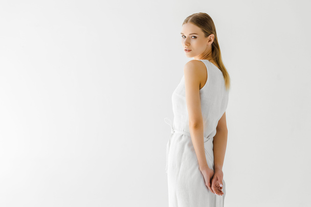 beautiful woman in linen white dress posing isolated on grey background  - Fotoğraf, Görsel