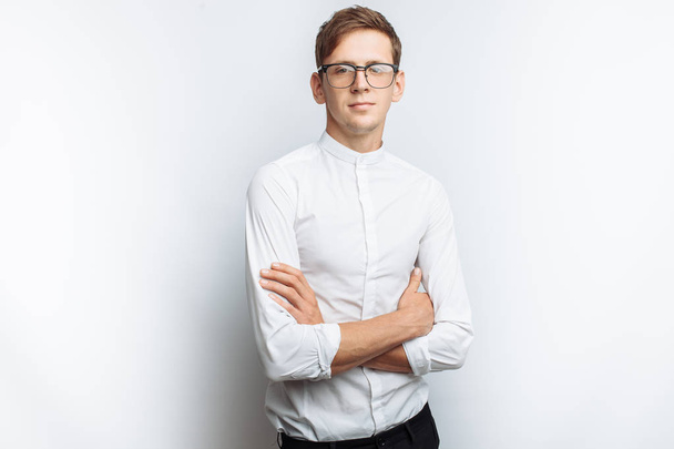 Portrait of young attractive guy in glasses, in white shirt, isolated on white background, - Φωτογραφία, εικόνα