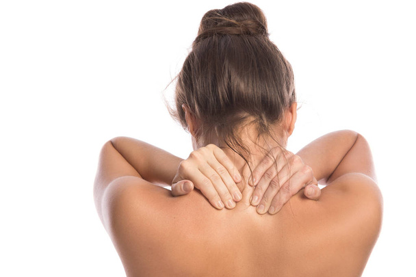 Woman with pain in back and neck on white background - Fotó, kép