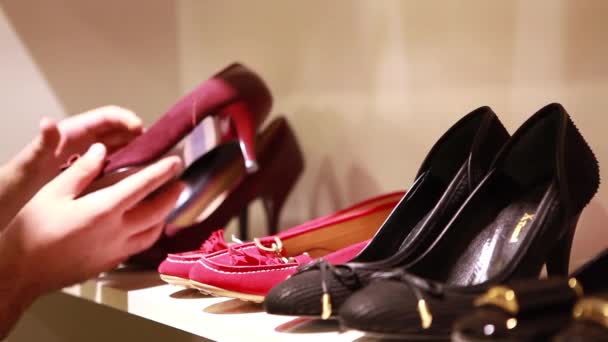 womens clothing store shoes section - Footage, Video