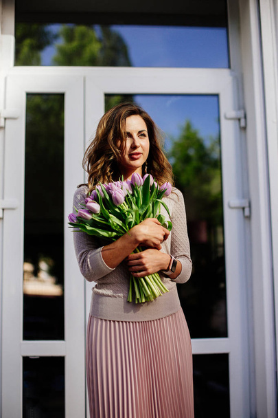 Bouquet of tulips in hands. - Fotó, kép
